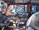 Eric KB7DQH's shack takes up the entire passenger side.  Count the number of transceivers and scanners.... WOW!
